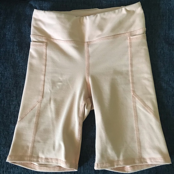 UO Seamed Biker Short in Coral - Picture 3 of 5